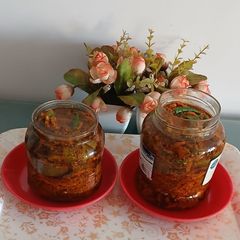 A picture of Raw Mango carrot green chili garlic pickle.