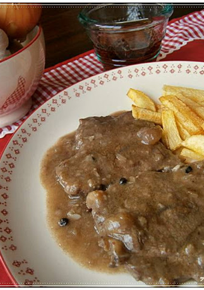 Una foto de Filetes de ternera en salsa de cebolla