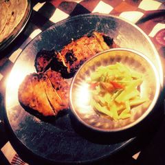 A picture of Pan seared Chicken Breast with Mango Salsa.