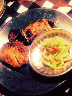 A picture of Pan seared Chicken Breast with Mango Salsa.