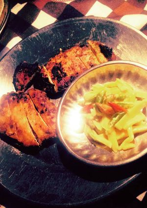A picture of Pan seared Chicken Breast with Mango Salsa.
