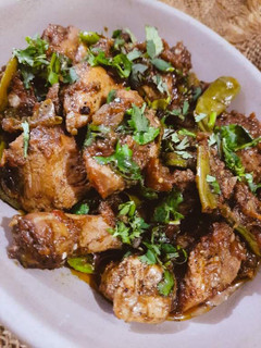 A picture of 3 Spice khatti karahi.