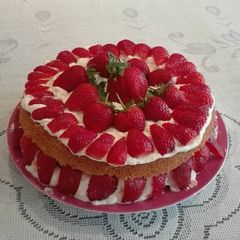 A picture of Strawberry and cream rosewater sponge cake.