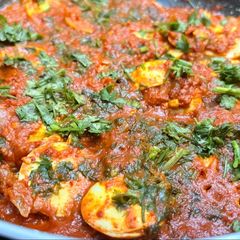 A picture of Cheesy Egg Roast Masala.