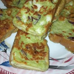 A picture of Bread into egg.