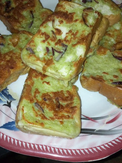 A picture of Bread into egg.