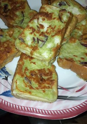 A picture of Bread into egg.