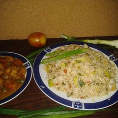 A picture of Chicken fried rice.