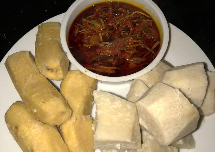 Boiled plantain and yam with Akpaka sauce