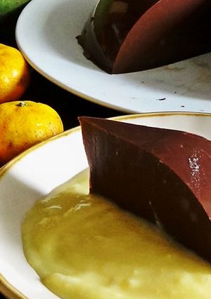 A picture of Soft Chocolate Pudding With Custard Sauce.