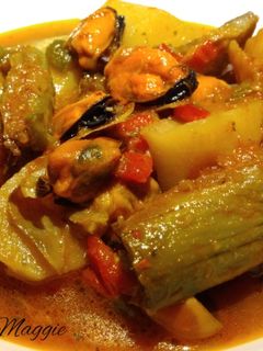 Una foto de Guiso de patatas con alcachofas y mejillones