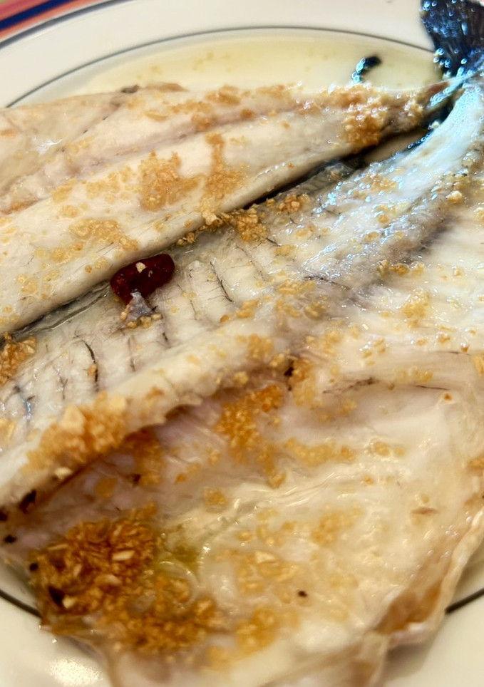 Una foto de Dorada al horno con vuelcos 🐟