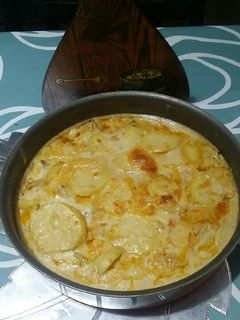 صورة لوصفة صينية البطاطس والدجاج بالبشاميل