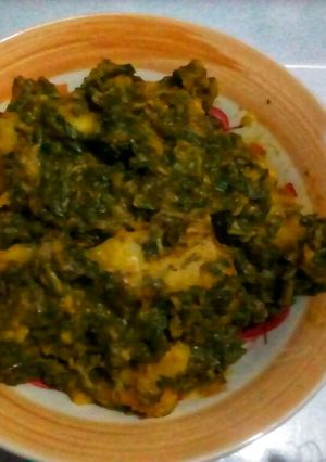 A picture of Spinach (Green)Porridge Yam.