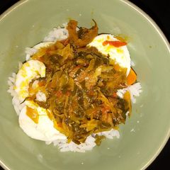 A picture of White rice with veggies.