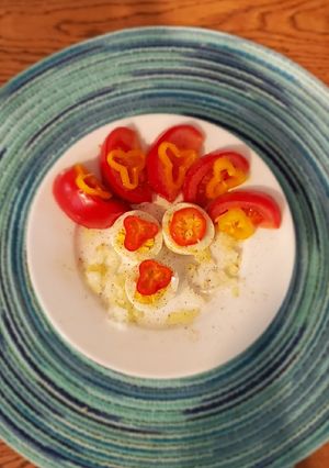 A picture of Egg and tomato salad.