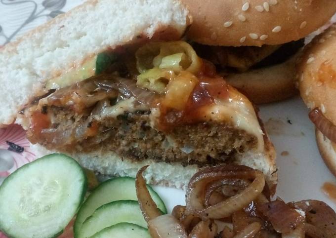 Beef steak style burgers serve with Apple Mac salad and fries