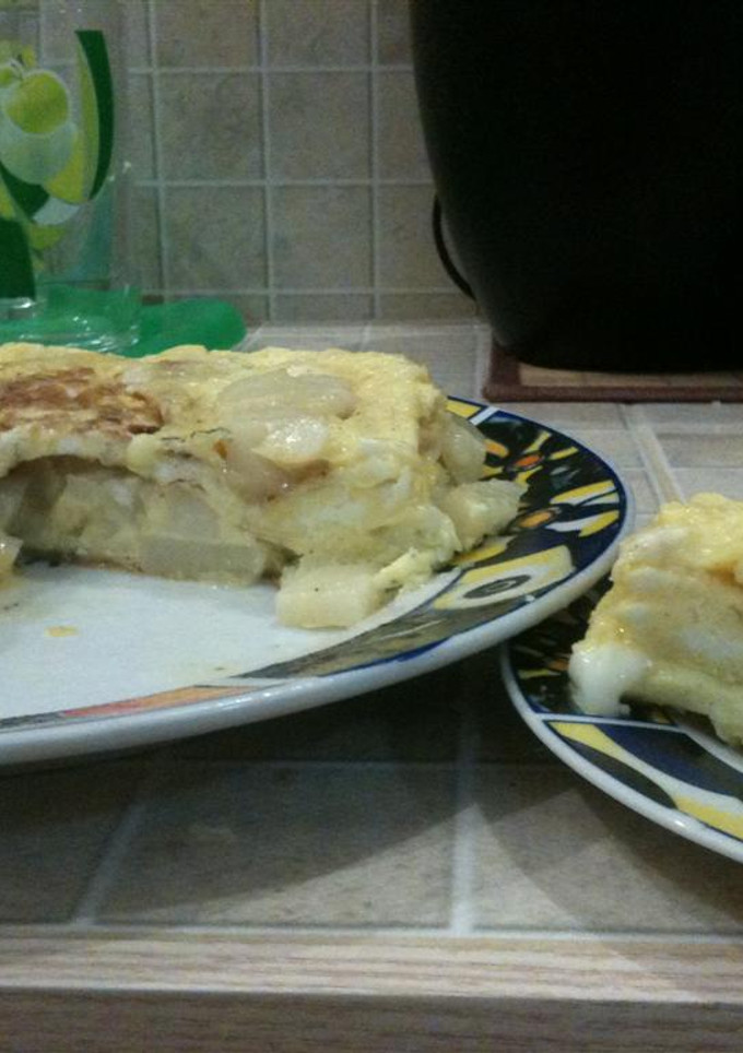 Una foto de Tambor de huevos con papas y queso