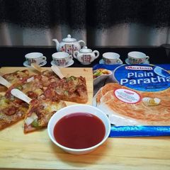 A picture of Paratha Pizza Popsicle.