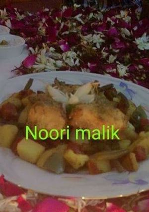 A picture of Steam_chicken With mix_vegetabales_ In foile_baked.