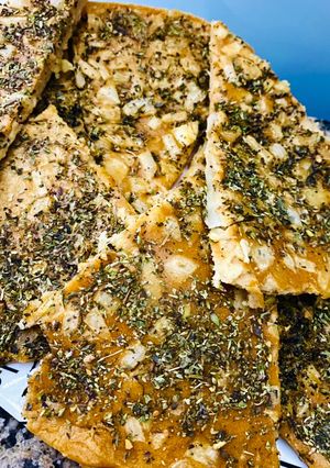 Una foto de 🍕FAINA 🍕🍕ESPECIADA CON 🧅CEBOLLA🧅