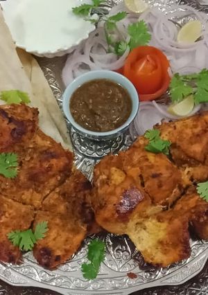 A picture of Chicken tikka with puri.