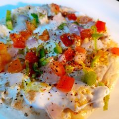A picture of Cheese kulcha pizza.