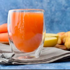 A picture of My morning carrot, apple,  ginger juice.