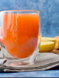 A picture of My morning carrot, apple, ginger juice.