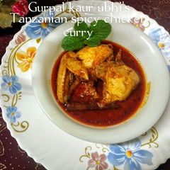 A picture of Tanzanian spicy chicken curry 🐓🍅.