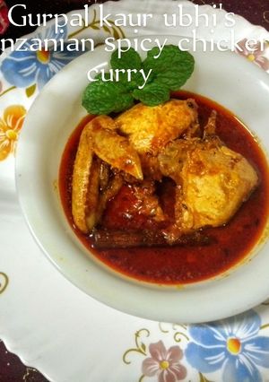 A picture of Tanzanian spicy chicken curry 🐓🍅.
