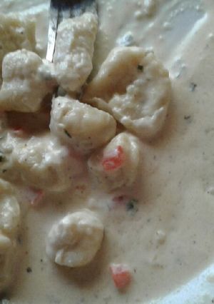 Una foto de Ñoquis de papa con crema de leche
