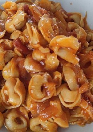Una foto de Tortelinis con salsa Amatriciana