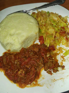 A picture of Beef stew and cabbage.