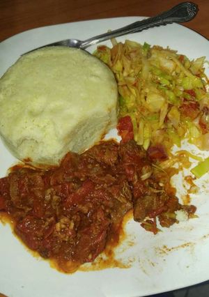 A picture of Beef stew and cabbage.