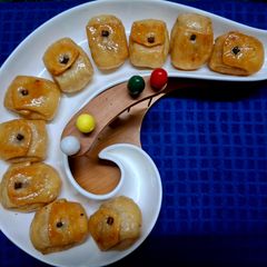 A picture of Crunchy Layered Coconut Kheer Lobongo Lotika.