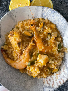 Una foto de Arroz caldoso de marisco y pescado