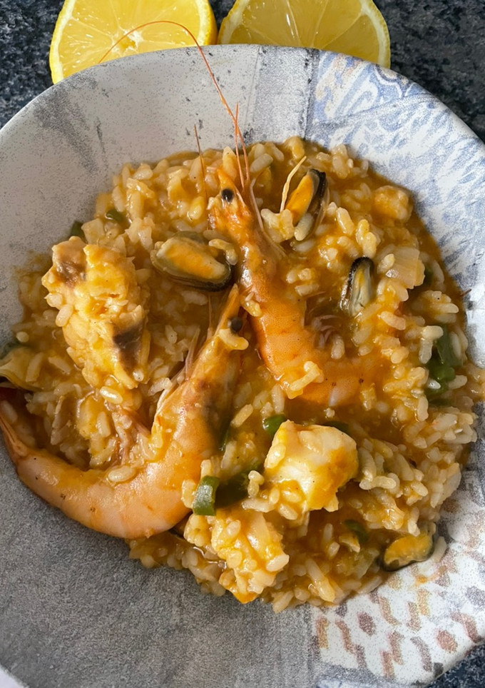 Una foto de Arroz caldoso de marisco y pescado