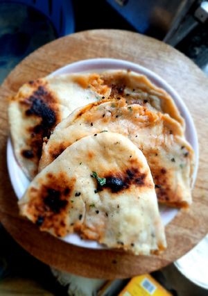 A picture of Aloo kulcha with chhole.