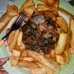 A picture of Fried potato with vegetable sauce.