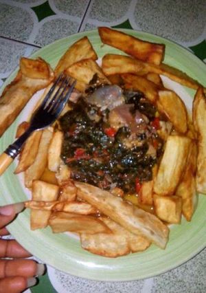A picture of Fried potato with vegetable sauce.