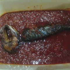 Tomato stew with fried fish A picture of Tomato stew with fried fish.