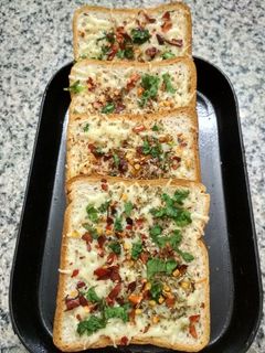 ગાર્લિક બ્રેડ(Garlic bread recipe in Gujarati) રેસીપી મુખ્ય ફોટો