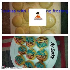 A picture of Plain Cookies with butter cream frosting.