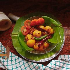 A picture of Aloo Dum(Bengali-Style Spicy Potato Curry)গরম মশলায় আলুর দম | A Bengali-Style Spicy Potato Curry.