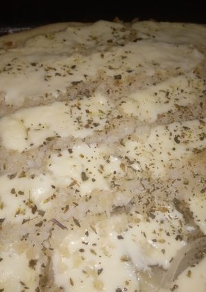 Una foto de Pizza Con Filet de Merluza