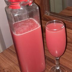 A picture of Watermelon and Orange juice.