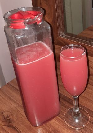 A picture of Watermelon and Orange juice.