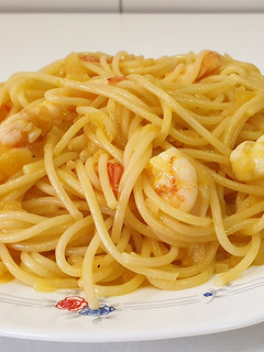 Una foto de Espaguetis con salsa de naranja
