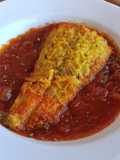 Bacalao rebozado en salsa de tomate especiado